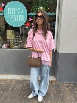 Asymmetrisch t-shirt met kant aan de onderkant roze